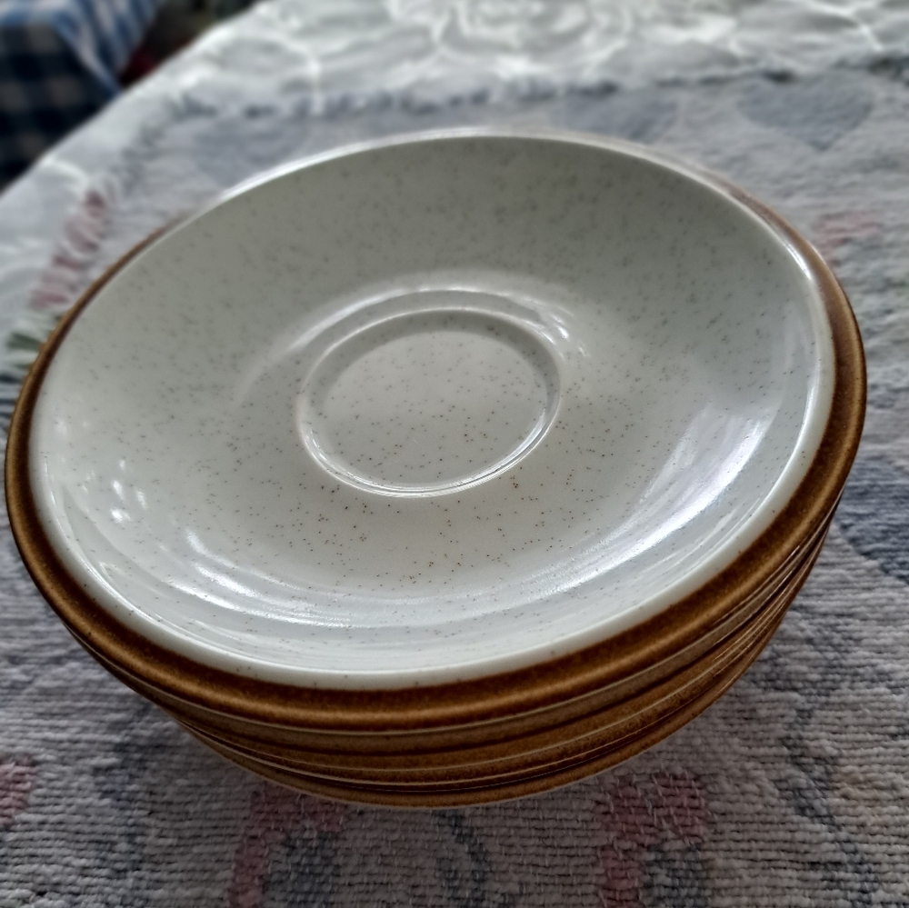- Four  MIKASA SAUCERS